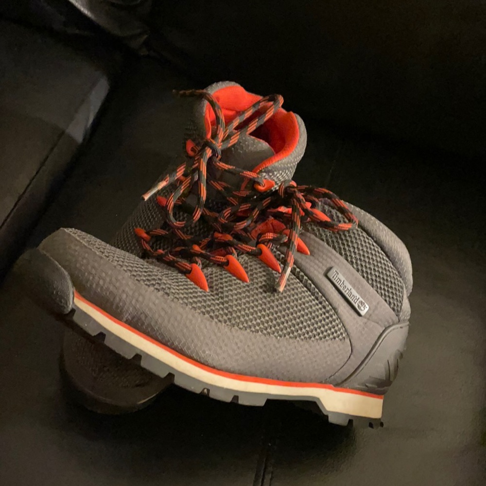 Dark grey Timberland Boots-trimmed in Orange, Black and Orange shoestrings.